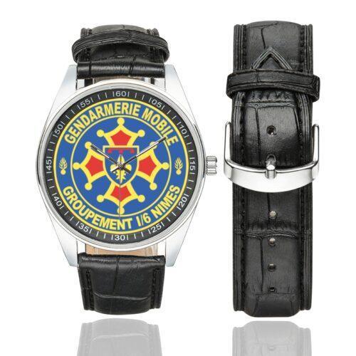 Men's casual watch with a round dial featuring the GGM 1-6 Nimes emblem, silver-tone case and black leather strap, shown with the strap to the side.
