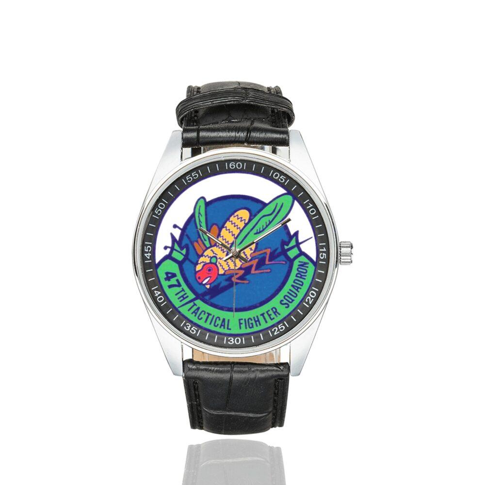 Men's casual watch with a round dial featuring the USAF 47th Tactical Fighter Squadron emblem, silver-tone case and black leather strap.