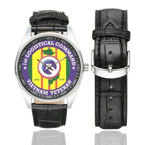 Men's casual watch with a round dial featuring the US Army 1st Logistical Command Vietnam Veteran emblem, silver-tone case and black leather strap, shown with the strap to the side.