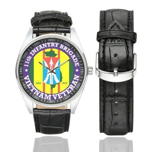 Men's casual watch with a round dial featuring the US Army 11th Infantry Division Vietnam Veteran- emblem, silver-tone case and black leather strap, shown with the strap to the side.