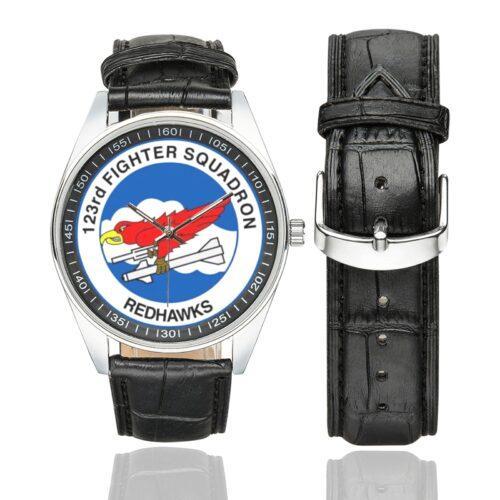 Men's casual watch with a round dial featuring the USAF 123rd Fighter Squadron emblem, silver-tone case and black leather strap, shown with the strap to the side.