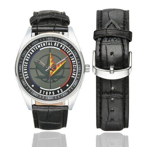 Men's casual watch with a round dial featuring the Stups 93 emblem, silver-tone case and black leather strap, shown with the strap to the side.