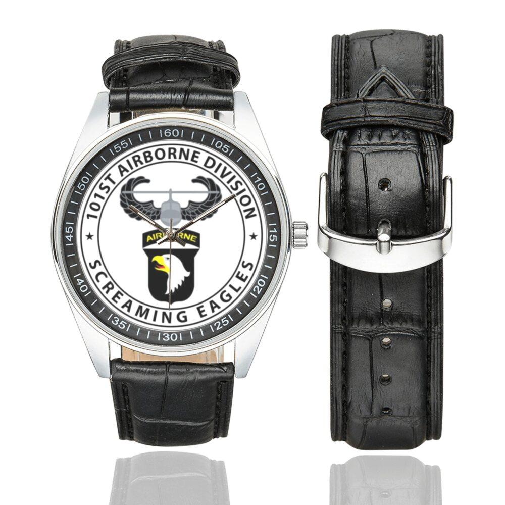 Men's casual watch with a round dial featuring the 101st Airborne Army Paratrooper emblem, silver-tone case and black leather strap, shown with the strap to the side.