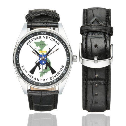 Men's casual watch with a round dial featuring the Vietnam Veteran 23rd Infantry Division emblem, silver-tone case and black leather strap, shown with the strap to the side.