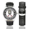 Men's casual watch with a round dial featuring the US Army 101st Airborne OEF Afghanistan Combat Veteran emblem, silver-tone case and black leather strap, shown with the strap to the side.