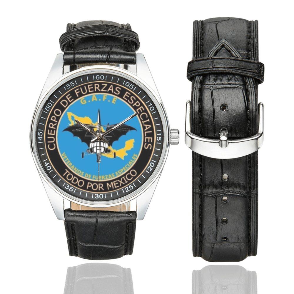 Men's casual watch with a round dial featuring the Mexican Special Forces emblem, silver-tone case and black leather strap, shown with the strap to the side.