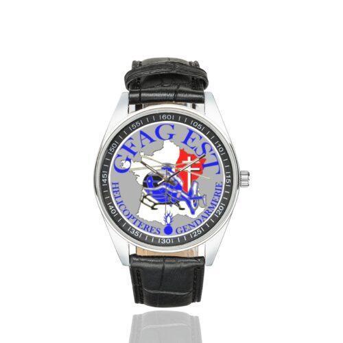Men's casual watch with a round dial featuring the GFAG EST emblem, silver-tone case and black leather strap.
