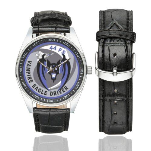 Men's casual watch with a round dial featuring the USAF 44th Fighter Squadron Vampire Eagle Driver emblem, silver-tone case and black leather strap, shown with the strap to the side.