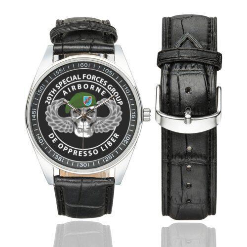Men's casual watch with a round dial featuring the 20th Special Forces Group emblem, silver-tone case and black leather strap, shown with the strap to the side.