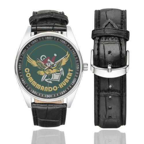 Men's casual watch with a round dial featuring the Commando Hubert emblem, silver-tone case and black leather strap, shown with the strap to the side.