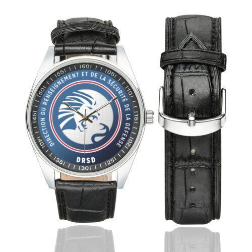 Men's casual watch with a round dial featuring the DRSD emblem, silver-tone case and black leather strap, shown with the strap to the side.