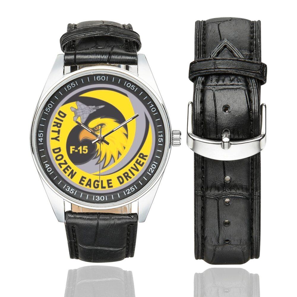 Men's casual watch with a round dial featuring the USAF 12th Fighter Squadron Dirty Dozen Eagle Driver emblem, silver-tone case and black leather strap, shown with the strap to the side.