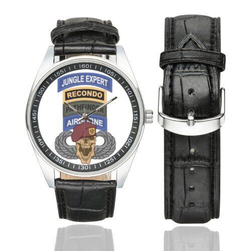 Men's casual watch with a round dial featuring the US Army Airborne Pathfinder Recondo emblem, silver-tone case and black leather strap, shown with the strap to the side.