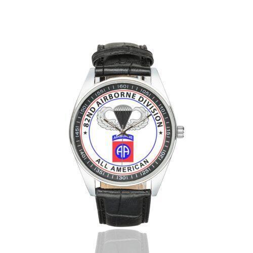 Men's casual watch with a round dial featuring the 82nd Airborne emblem, silver-tone case and black leather strap.
