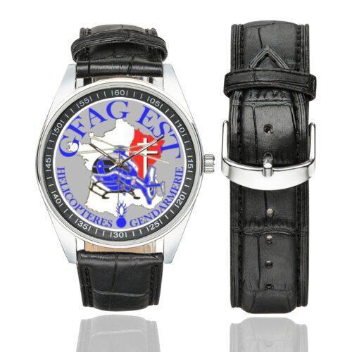 Men's casual watch with a round dial featuring the GFAG EST emblem, silver-tone case and black leather strap, shown with the strap to the side.