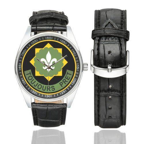Men's casual watch with a round dial featuring the US Army 2nd Armored Cavalry Regiment emblem, silver-tone case and black leather strap, shown with the strap to the side.