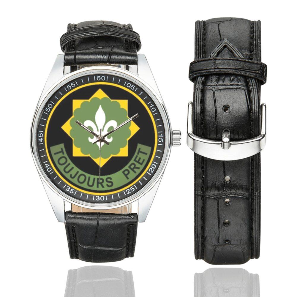 Men's casual watch with a round dial featuring the US Army 2nd Armored Cavalry Regiment emblem, silver-tone case and black leather strap, shown with the strap to the side.