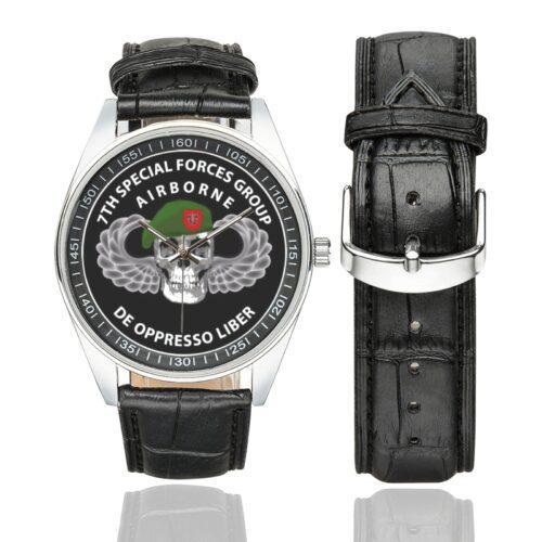 Men's casual watch with a round dial featuring the 7th-special-forces emblem, silver-tone case and black leather strap, shown with the strap to the side.
