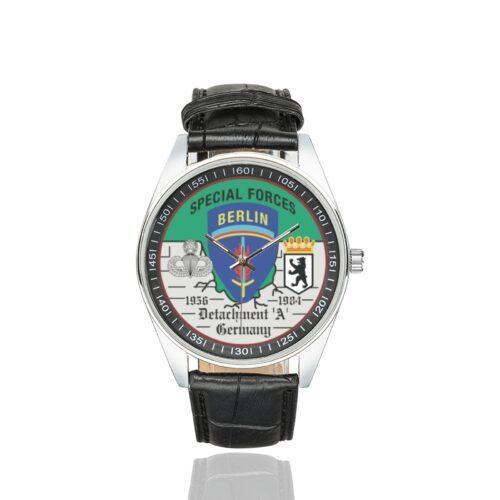 Men's casual watch with a round dial featuring the US Army Special Forces Detachment A Berlin Brigade emblem, silver-tone case and black leather strap.