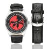 Men's casual watch with a round dial featuring the Belgian 1st Para Commando Regiment emblem, silver-tone case and black leather strap, shown with the strap to the side.