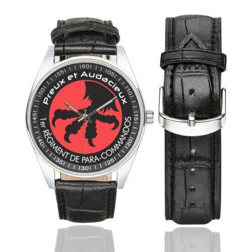 Men's casual watch with a round dial featuring the Belgian 1st Para Commando Regiment emblem, silver-tone case and black leather strap, shown with the strap to the side.