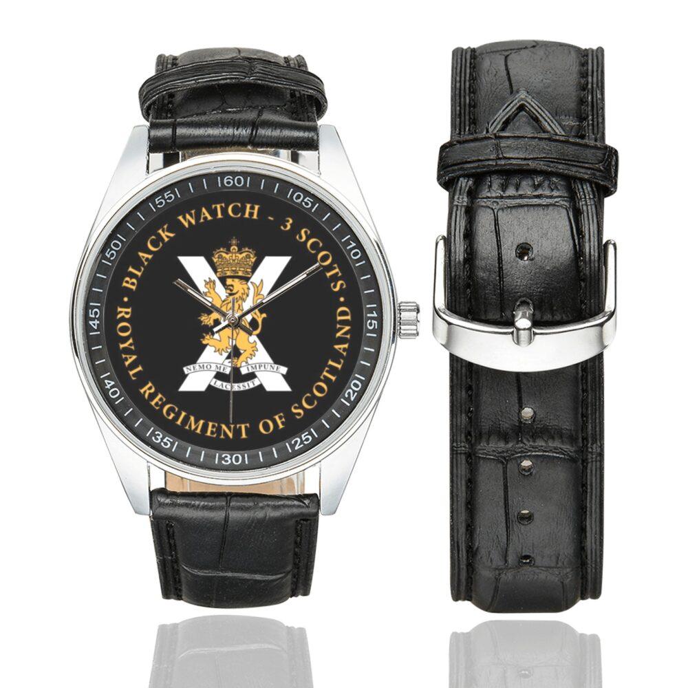 Men's casual watch with a round dial featuring the Black Watch Scotland Military emblem, silver-tone case and black leather strap, shown with the strap to the side.