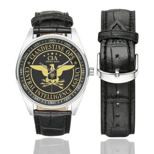 Men's casual watch with a round dial featuring the CIA Clandestine Operations emblem, silver-tone case and black leather strap, shown with the strap to the side.