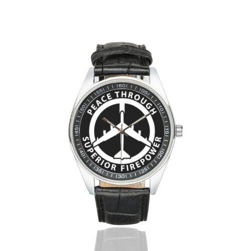 Men's casual watch with a round dial featuring the Peace Through Superior Firepower B52 Bomber emblem, silver-tone case and black leather strap.