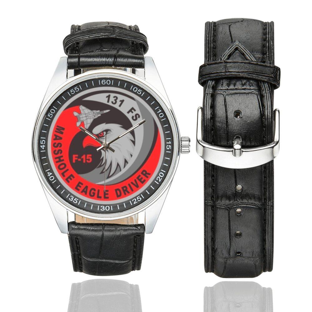 Men's casual watch with a round dial featuring the USAF 131st Fighter Squadron Masshole Eagle Driver emblem, silver-tone case and black leather strap, shown with the strap to the side.
