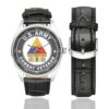 Men's casual watch with a round dial featuring the US Army 1st Armored Division Desert Storm Combat Veteran emblem, silver-tone case and black leather strap, shown with the strap to the side.