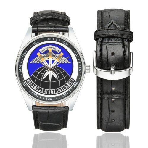 Men's casual watch with a round dial featuring the 21st STS Special Tactics Squadron emblem, silver-tone case and black leather strap, shown with the strap to the side.