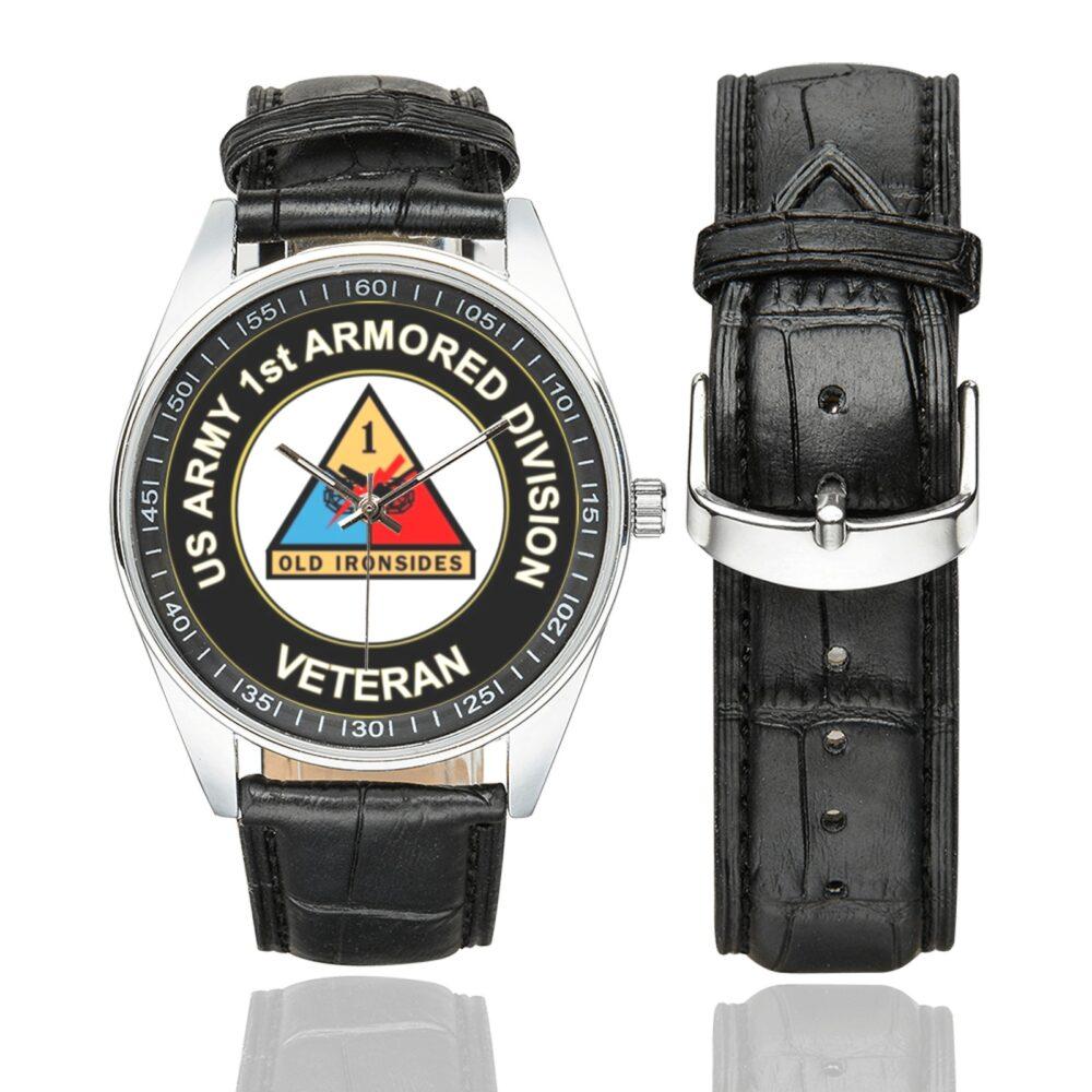 Men's casual watch with a round dial featuring the US Army 1st Armored Division Veteran emblem, silver-tone case and black leather strap, shown with the strap to the side.