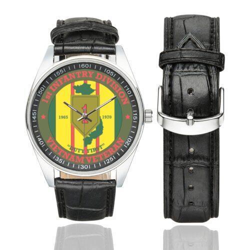 Men's casual watch with a round dial featuring the US Army 1st Infantry Division Vietnam Veteran emblem, silver-tone case and black leather strap, shown with the strap to the side.