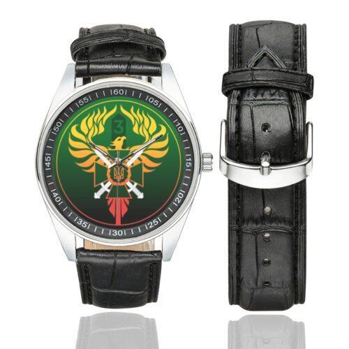 Men's casual watch with a round dial featuring the 3rd Border Detachment Pomsta Brigade emblem, silver-tone case and black leather strap, shown with the strap to the side.