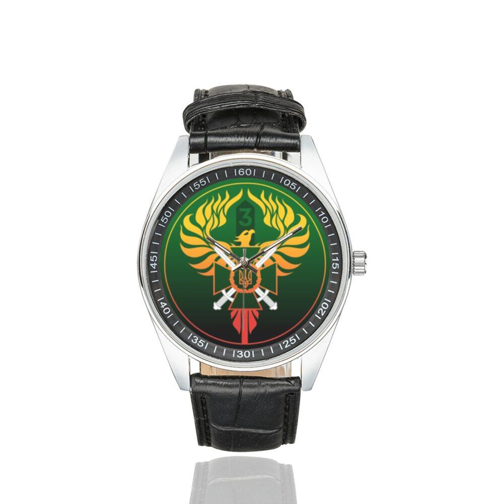 Men's casual watch with a round dial featuring the 3rd Border Detachment Pomsta Brigade emblem, silver-tone case and black leather strap.