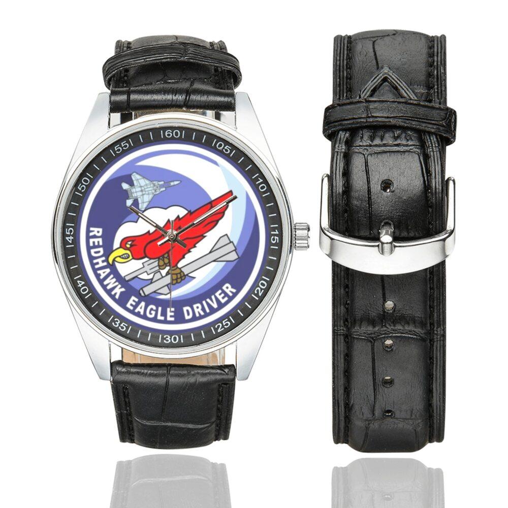 Men's casual watch with a round dial featuring the USAF 123rd Fighter Squadron Redhawk Eagle Driver emblem, silver-tone case and black leather strap, shown with the strap to the side.