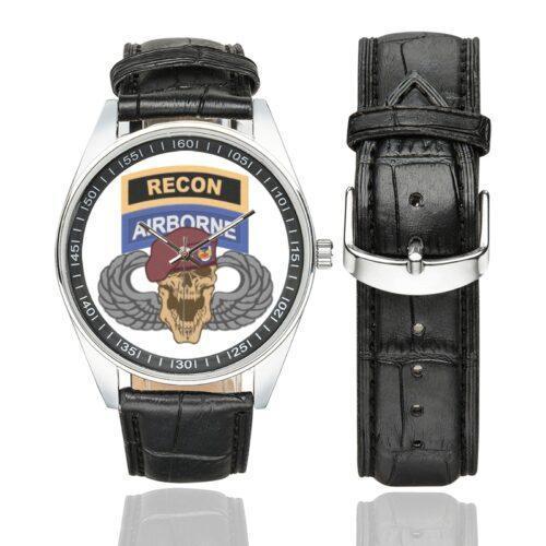 Men's casual watch with a round dial featuring the US Army Airborne Recon emblem, silver-tone case and black leather strap, shown with the strap to the side.