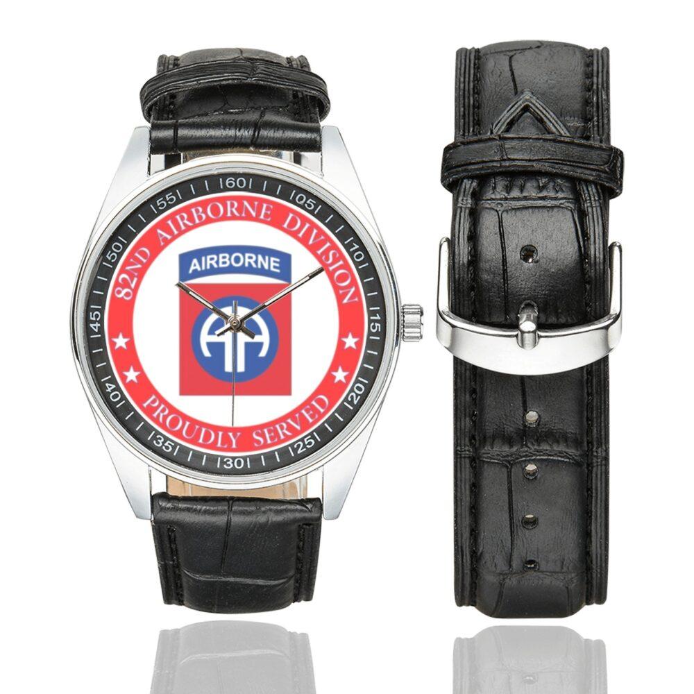 Men's casual watch with a round dial featuring the US Army 82nd Airborne Division veteran emblem, silver-tone case and black leather strap, shown with the strap to the side.