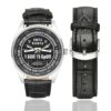 Men's casual watch with a round dial featuring the Kara-Dag Brigade 1st Battalion of Operational Assignment emblem, silver-tone case and black leather strap, shown with the strap to the side.
