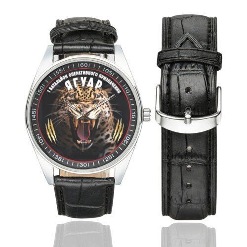 Men's casual watch with a round dial featuring the 1st Battalion of Operational Assignment emblem, silver-tone case and black leather strap, shown with the strap to the side.