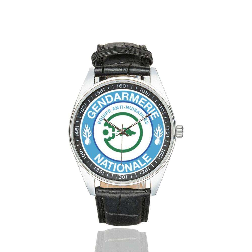 Men's casual watch with a round dial featuring the Ecusson Anti-Nuisances emblem, silver-tone case and black leather strap.