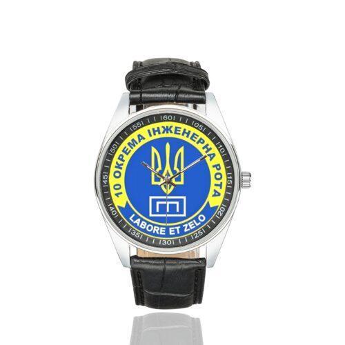Men's casual watch with a round dial featuring the 10th Separate Engineering Company emblem, silver-tone case and black leather strap.