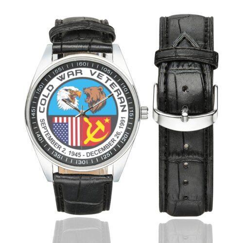 Men's casual watch with a round dial featuring the Cold War Veteran emblem, silver-tone case and black leather strap, shown with the strap to the side.