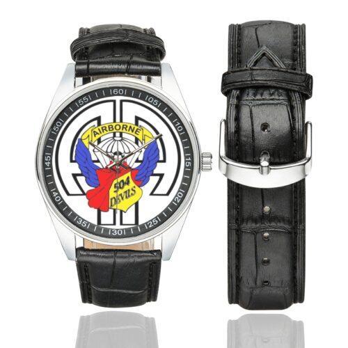 Men's casual watch with a round dial featuring the US Army 504th Parachute Infantry Regt. emblem, silver-tone case and black leather strap, shown with the strap to the side.