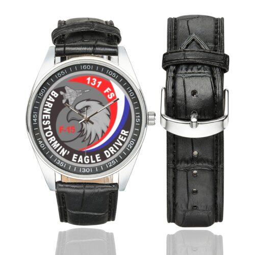 Men's casual watch with a round dial featuring the USAF 131st Fighter Squadron Eagle Driver emblem, silver-tone case and black leather strap, shown with the strap to the side.