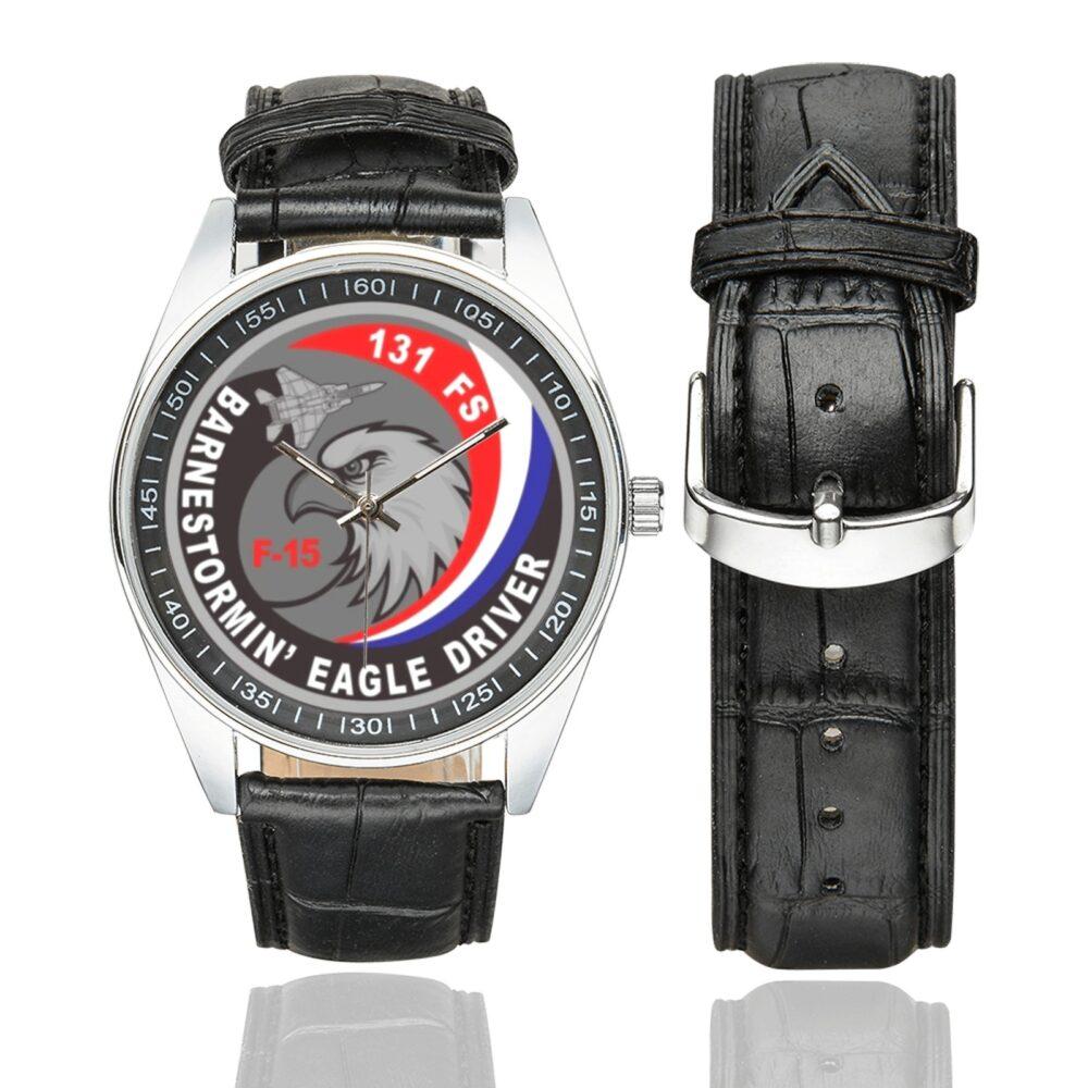 Men's casual watch with a round dial featuring the USAF 131st Fighter Squadron Eagle Driver emblem, silver-tone case and black leather strap, shown with the strap to the side.