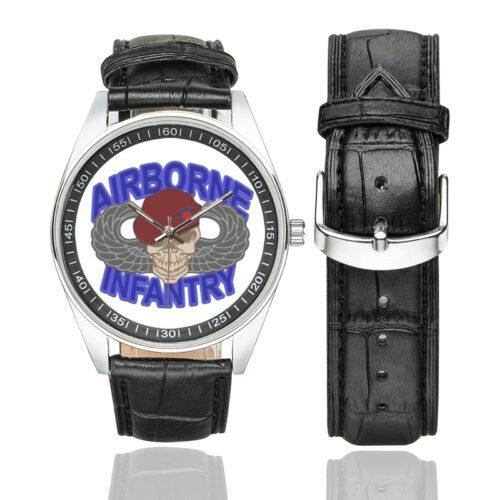 Men's casual watch with a round dial featuring the US Army Airborne Infantry emblem, silver-tone case and black leather strap, shown with the strap to the side.