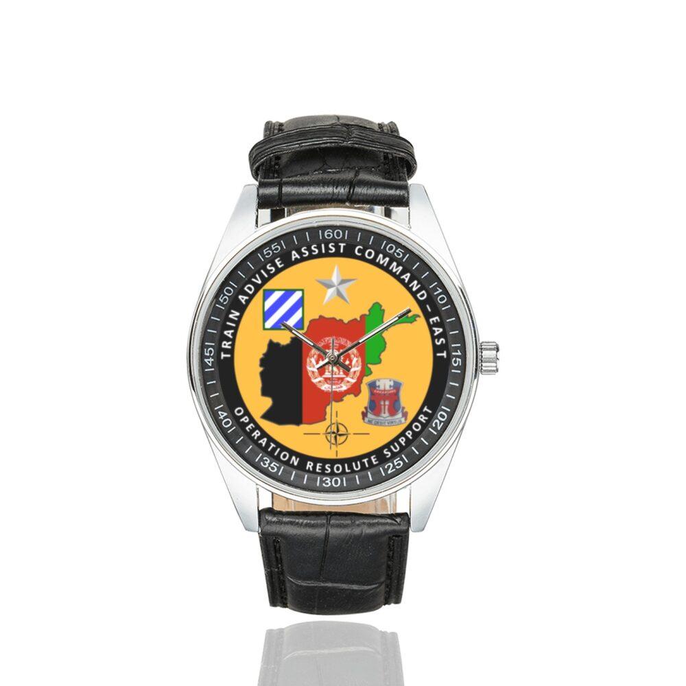 Men's casual watch with a round dial featuring the Operation Resolute Support Task Force Southeast Afghanistan emblem, silver-tone case and black leather strap.