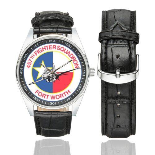 Men's casual watch with a round dial featuring the USAF 457th Fighter Squadron emblem, silver-tone case and black leather strap, shown with the strap to the side.