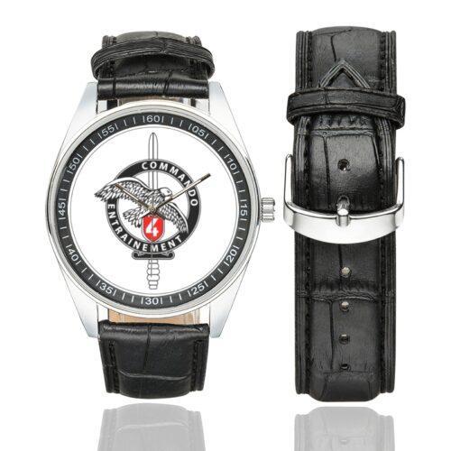 Men's casual watch with a round dial featuring the French Commando Commando School 4 emblem, silver-tone case and black leather strap, shown with the strap to the side.